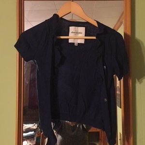 Blue shrug with ruffled edges